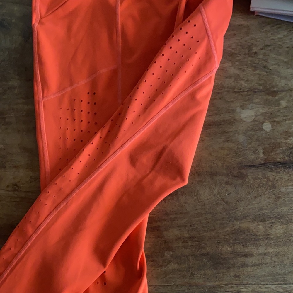 Athleta neon orange leggings